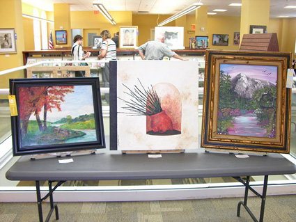 Three painting on display at the 2015 Senior Citizen Artshow held at the Ventnor Library.